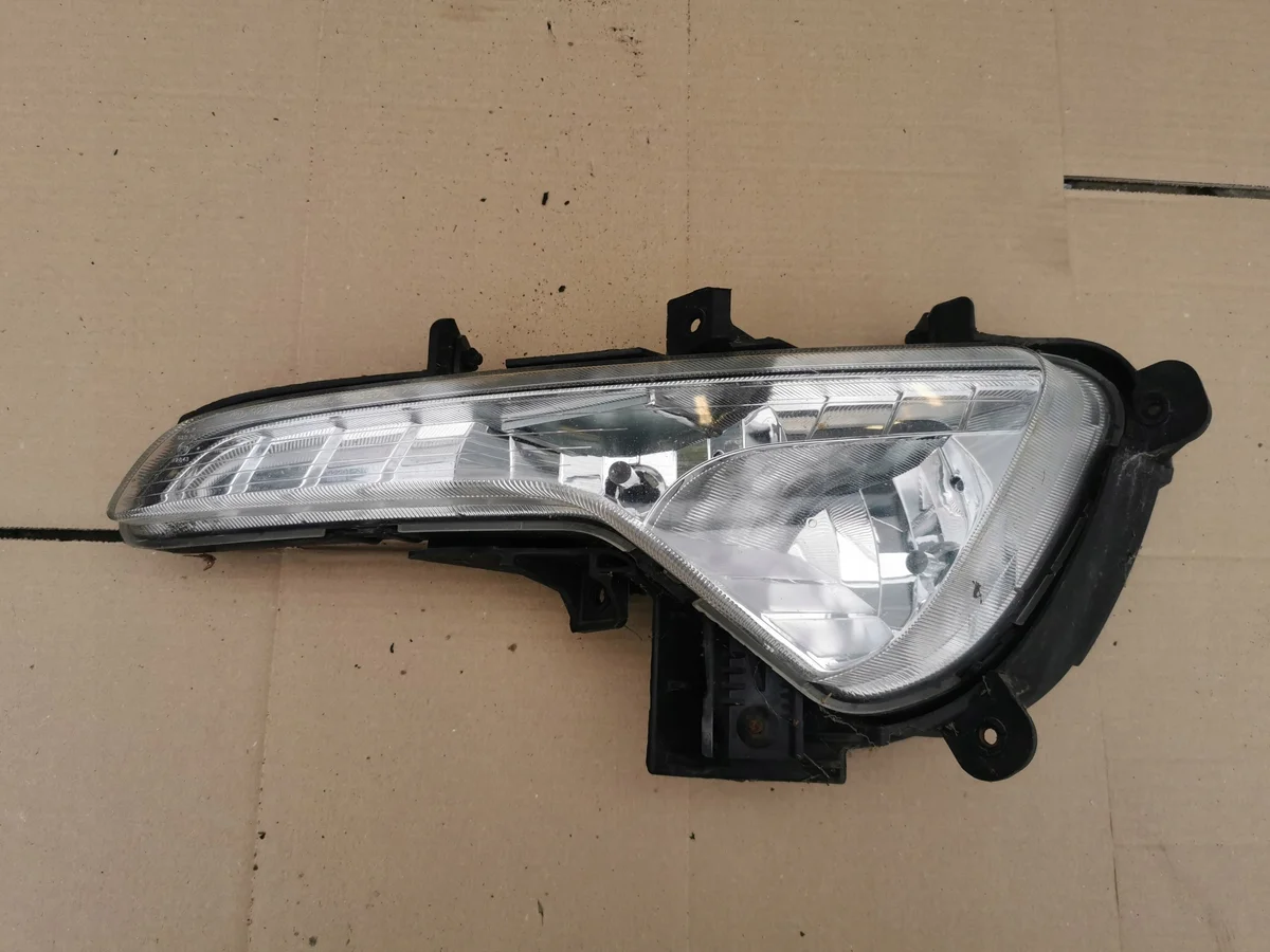 Nebelscheinwerfer links Kia Sportage III 92201-3W