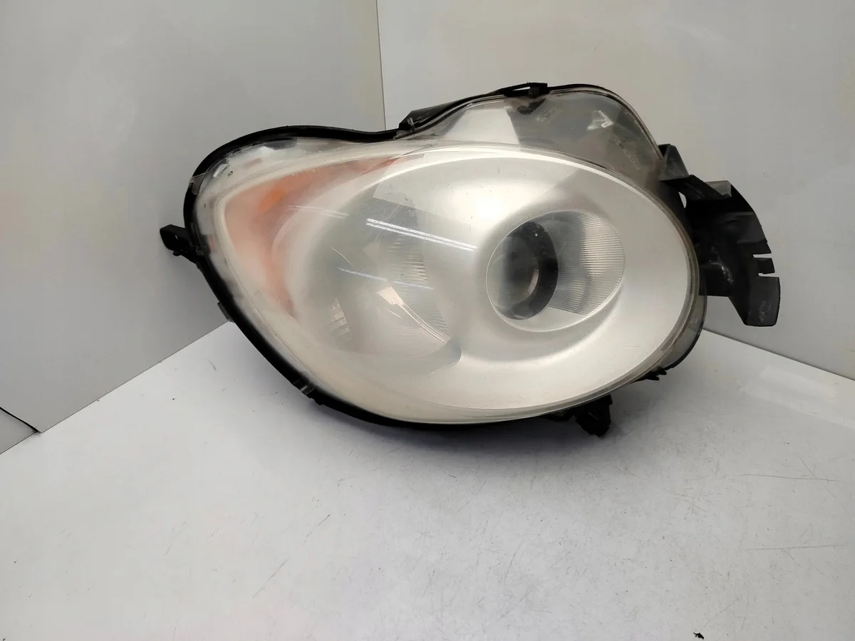 Strålkastare vänster fram Alfa Romeo Mito 23R16