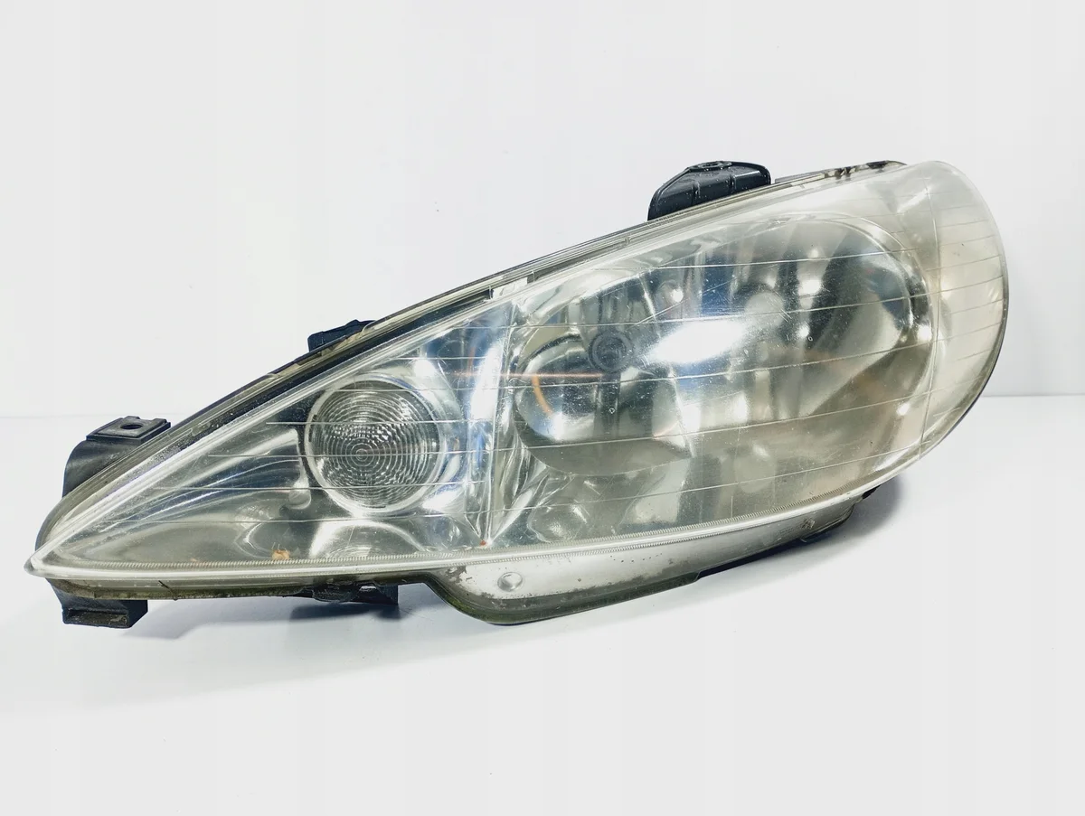 Strålkastare vänster Peugeot 206 CC M3R7P3