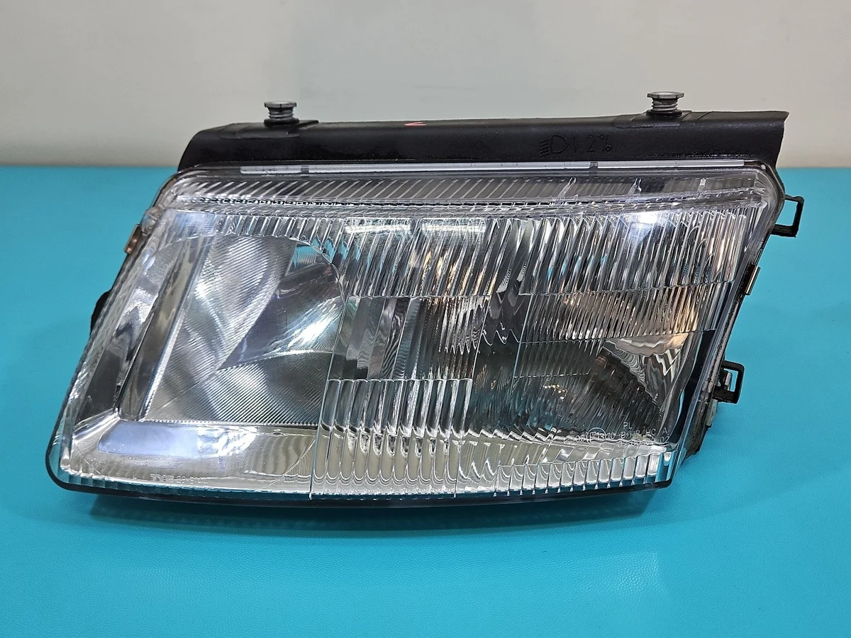 VW Passat B5 Scheinwerfer links H4 H7