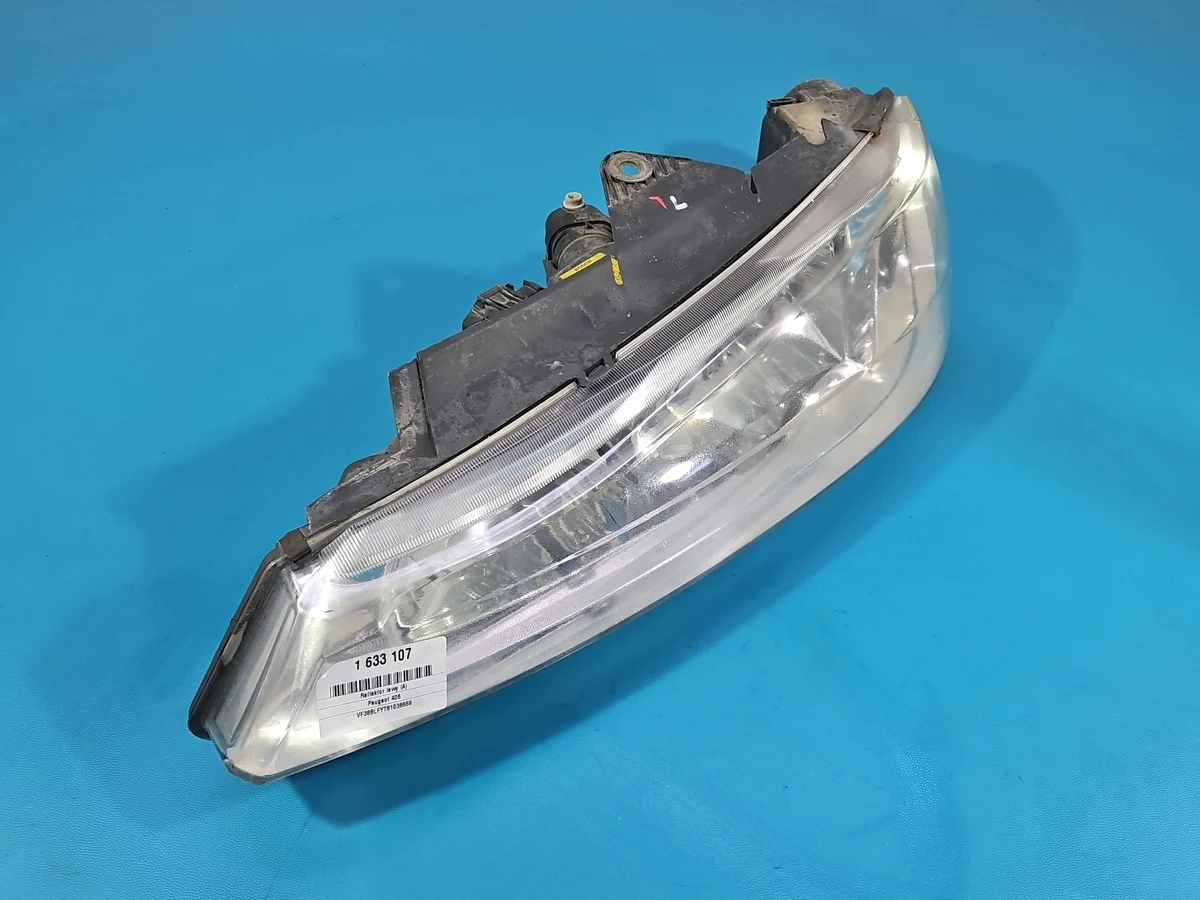 Strålkastare vänster Peugeot 406 9630423277