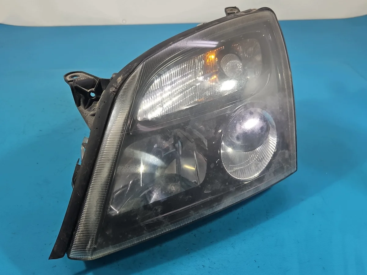 Faro delantero Opel Vectra C izquierdo