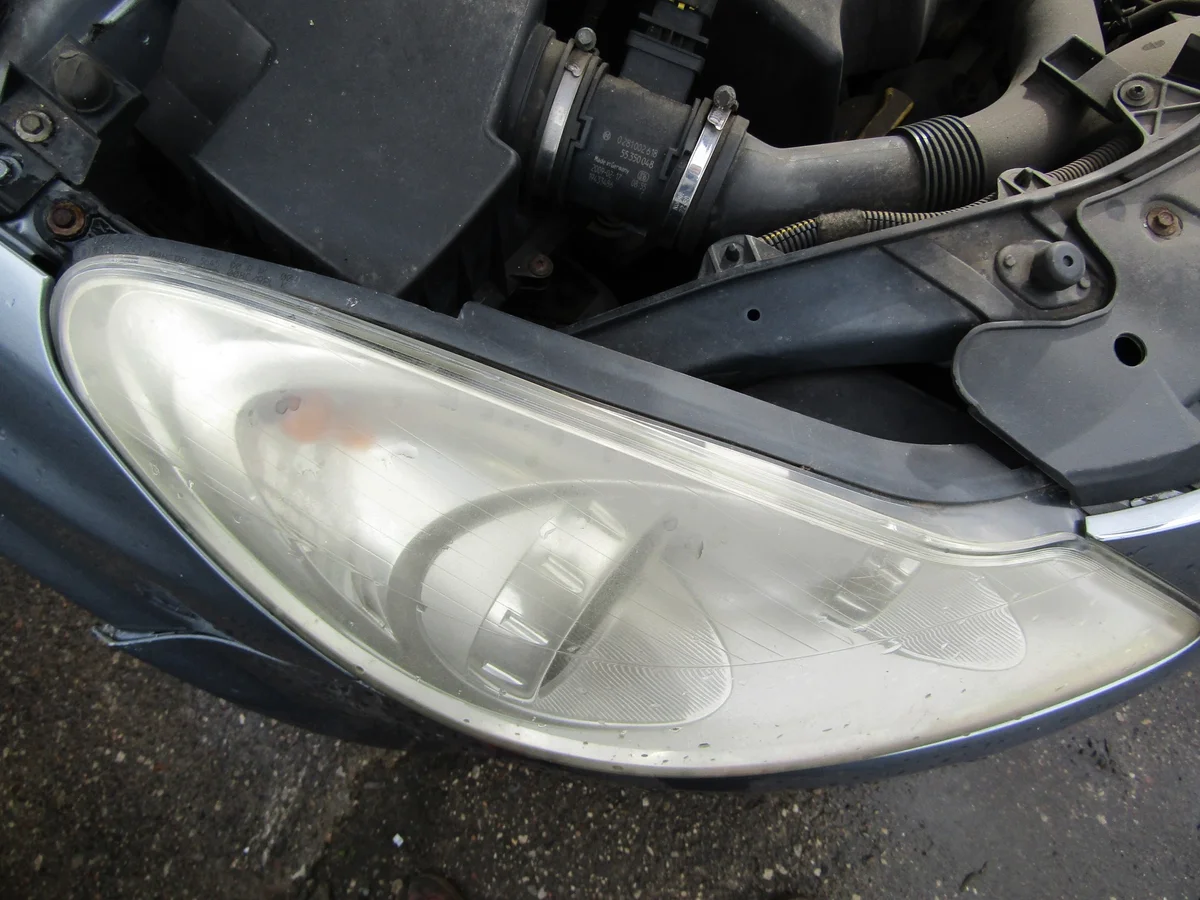 Opel Corsa D Faro delantero derecho