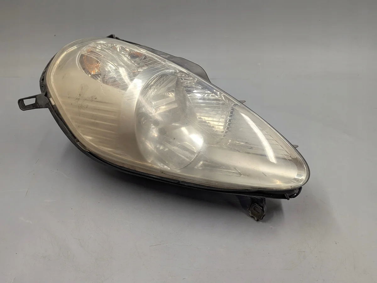 Farol Esquerdo Fiat Grande Punto 89101372SX