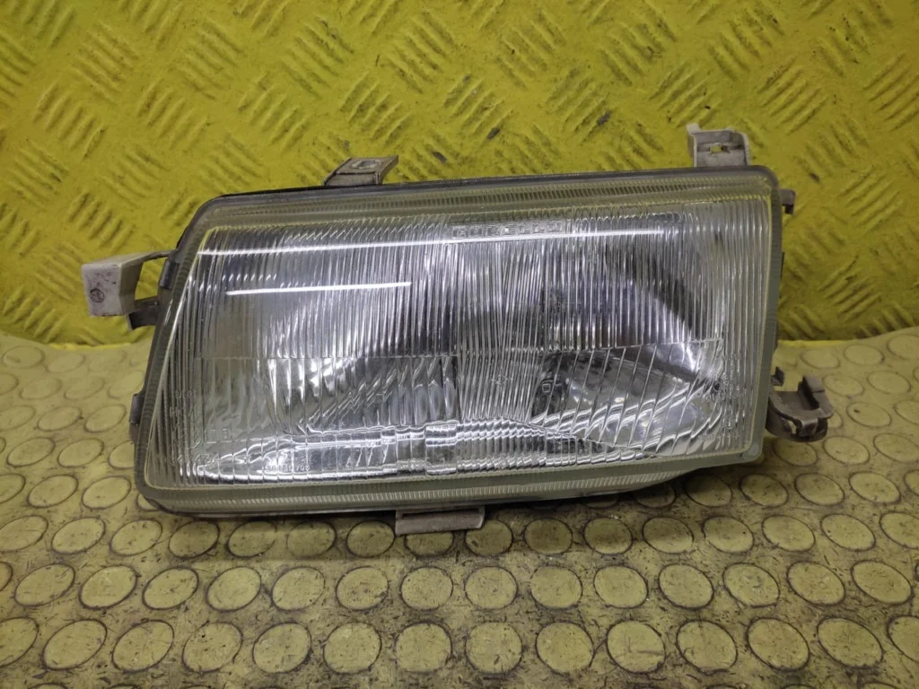 Phare gauche Opel Astra F 90341849