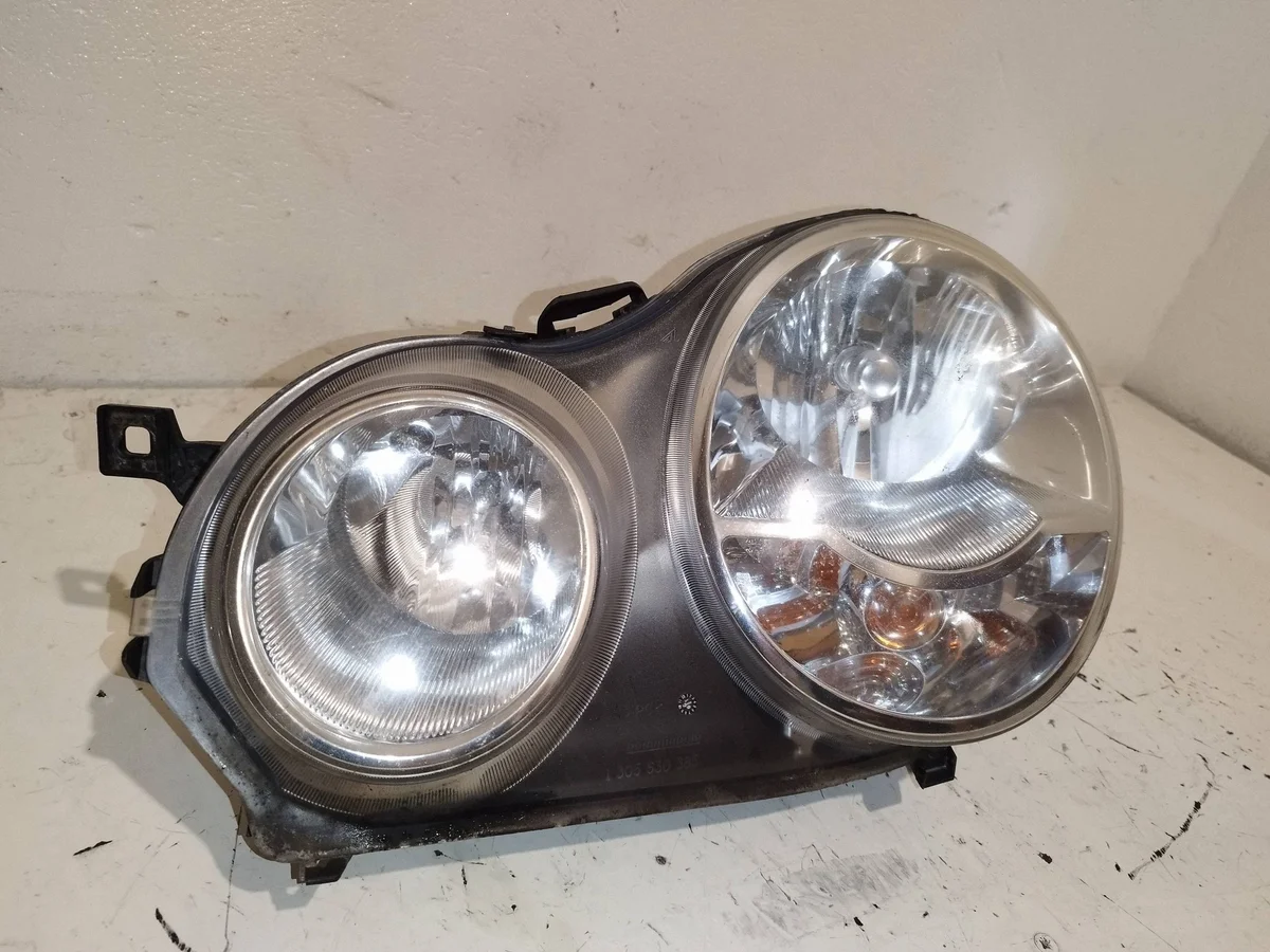 Faro delantero izquierdo VW Polo IV XER13746