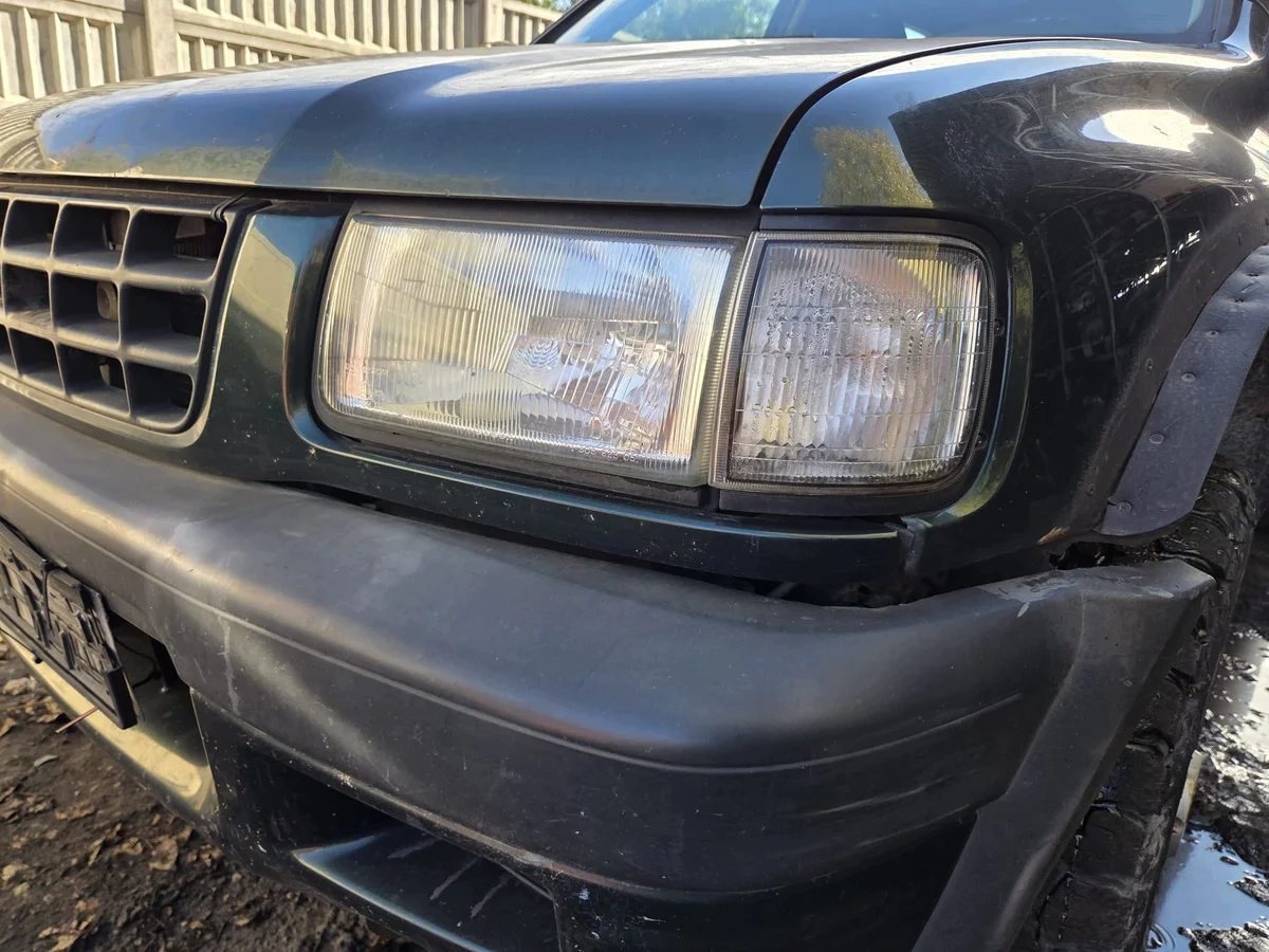 Phare avant gauche Opel Frontera B