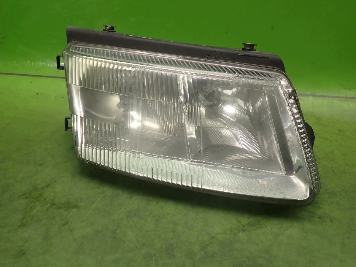 Faro delantero VW Passat B5 TYC 20-5079